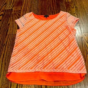 Deep peach colored top